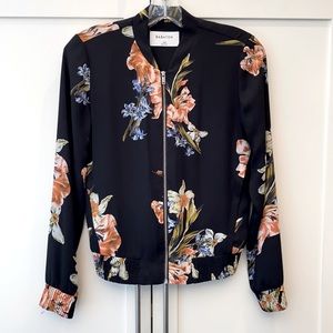 Babaton women’s black floral lightweight bomber style spring jacket.